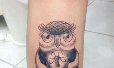 Owl on neck tattoo meaning